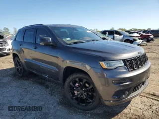 2019 Jeep Grand Cherokee Summit with VIN 1C4RJFJGXKC655979, listed as a Copart auction lot 73033194 with 121,720 mi miles and Salvage title. Bid and sale history available at DreamBid. Image 4.
