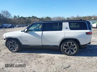 2025 Rivian R1S Adventure with VIN 7PDSGBBA0SN049154, listed as a IAAI auction lot 41160166 with 3,036 mi miles. Bid and sale history available at carsss.com. Image 14.