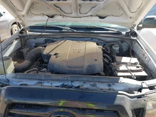 2011 Toyota Tacoma PreRunner with VIN 3TMJU4GN8BM111705, listed as a IAAI auction lot 41817612 with 212,334 mi miles and . Bid and sale history available at DreamBid. Image 10.