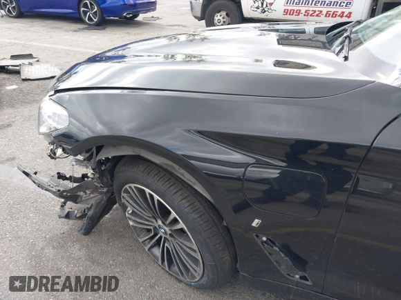 2019 BMW 5 Series 530e with VIN WBAJA9C52KB399480, listed as a IAAI auction lot 41714228 with 90,435 mi miles and . Bid and sale history available at DreamBid. Image 17.