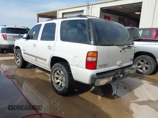 2002 GMC Yukon SLT z VIN 1GKEC13V02R300098, wystawiony jako IAAI lot #41583951 z przebiegiem 247 780 mil mil oraz . Historia ofert i sprzedaży dostępna na DreamBid. Obrazek 3.