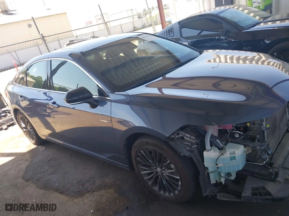 2019 Toyota Avalon Hybrid Limited with VIN 4T1B21FB4KU005887, listed as a IAAI auction lot 42014462 with 141,213 mi miles. Bid and sale history available at carsss.com. Image 14.