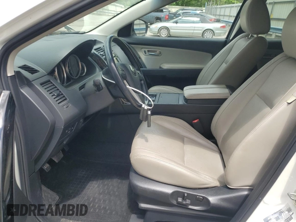 2014 Mazda CX-9 Touring z VIN JM3TB3CV7E0446466, wystawiony jako Copart lot #57631565 z przebiegiem 91 831 mil mil oraz Szkoda całkowita • Salvage title. Historia ofert i sprzedaży dostępna na DreamBid. Obrazek 7.