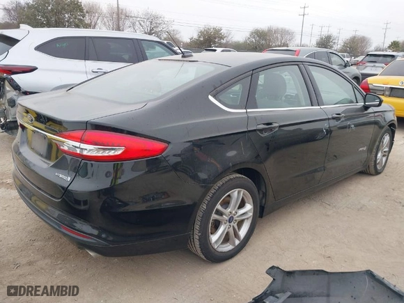 2018 Ford Fusion Hybrid S with VIN 3FA6P0UU9JR100852, listed as a IAAI auction lot 41516157 with 63,458 mi miles. Bid and sale history available at carsss.com. Image 4.