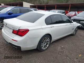 2014 BMW 7 Series ALPINA B7 with VIN WBAYE8C55ED134980, listed as a IAAI auction lot 41239686 with 145,435 mi miles. Bid and sale history available at carsss.com. Image 4.
