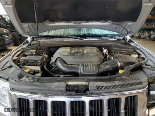 2011 Jeep Grand Cherokee Laredo with VIN 1J4RR4GG0BC583821, listed as a Copart auction lot 59176674 with 198,027 mi miles and Salvage Title. Bid and sale history available at carsss.com. Image 12.