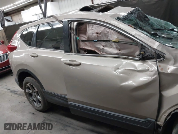 2018 Honda CR-V EX-L z VIN 2HKRW2H89JH671327, wystawiony jako IAAI lot #42159441 z przebiegiem Nie podano mil oraz . Historia ofert i sprzedaży dostępna na DreamBid. Obrazek 12.