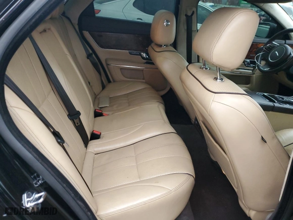 2013 Jaguar XJ with VIN SAJWA1C72D8V55787, listed as a Copart auction lot 76296884 with NaN miles and Salvage Title. Bid and sale history available at carsss.com. Image 10.