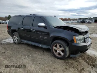 2014 Chevrolet Suburban LT with VIN 1GNSCJE01ER222961, listed as a Copart auction lot 84841744 with 168,131 mi miles and Salvage title. Bid and sale history available at DreamBid. Image 4.