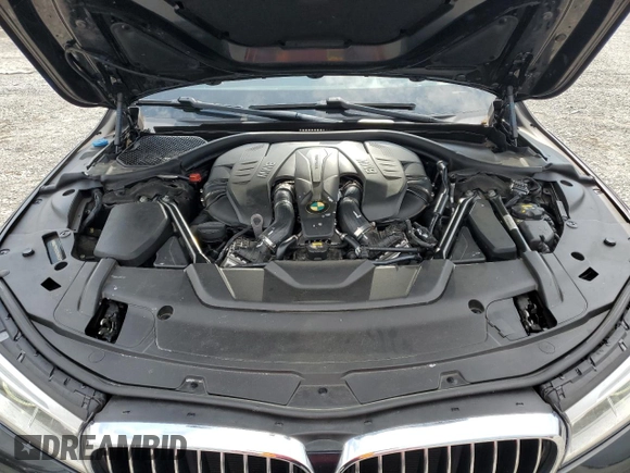 2016 BMW 7 Series 750i with VIN WBA7F0C53GGM20760, listed as a Copart auction lot 57230334 with 77,588 mi miles and Salvage Title. Bid and sale history available at carsss.com. Image 11.