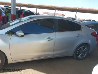 2016 Kia Forte EX with VIN KNAFX4A8XG5598156, listed as a IAAI auction lot 41980015 with 114,672 mi miles. Bid and sale history available at carsss.com. Image 13.