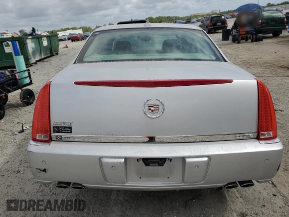2011 Cadillac DTS Premium Collection z VIN 1G6KH5E69BU137044, wystawiony jako Copart lot #54723905 z przebiegiem 128 081 mil mil oraz Szkoda całkowita • Salvage title. Historia ofert i sprzedaży dostępna na DreamBid. Obrazek 6.
