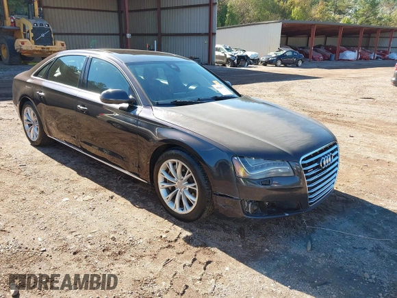 2011 Audi A8 with VIN WAURVAFDXBN014290, listed as a IAAI auction lot 40860777 with 152,584 mi miles and . Bid and sale history available at DreamBid. Image 1.