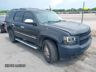 2011 Chevrolet Tahoe LTZ with VIN 1GNSCCE08BR215397, listed as a IAAI auction lot 42761403 with 225,526 mi miles and . Bid and sale history available at DreamBid. Image 1.