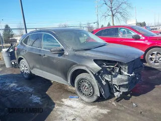 2021 Ford Escape Titanium z VIN 1FMCU9J90MUB23259, wystawiony jako IAAI lot #41535706 z przebiegiem 100 664 mil mil oraz . Historia ofert i sprzedaży dostępna na DreamBid. Obrazek 1.