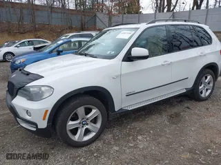 2009 BMW X5 30i with VIN 5UXFE43569L275733, listed as a IAAI auction lot 41897558 with 154,192 mi miles. Bid and sale history available at carsss.com. Image 2.