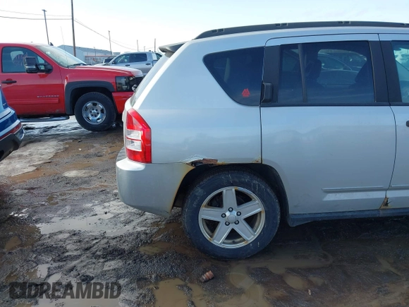 2008 Jeep Compass Sport with VIN 1J8FF47W58D703312, listed as a IAAI auction lot 41693818 with 156,161 mi miles. Bid and sale history available at carsss.com. Image 6.