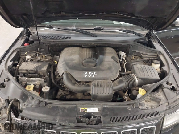 2014 Jeep Grand Cherokee Overland with VIN 1C4RJFCG8EC177899, listed as a IAAI auction lot 41695290 with 200,867 mi miles and . Bid and sale history available at DreamBid. Image 10.