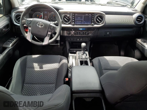 2022 Toyota Tacoma SR with VIN 3TMCZ5AN7NM477331, listed as a Copart auction lot 59991105 with 40,057 mi miles and Salvage title. Bid and sale history available at DreamBid. Image 8.