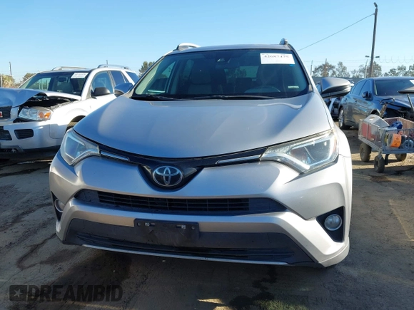 2018 Toyota RAV4 XLE with VIN 2T3WFREV8JW474230, listed as a IAAI auction lot 42687475 with 182,264 mi miles and . Bid and sale history available at DreamBid. Image 12.
