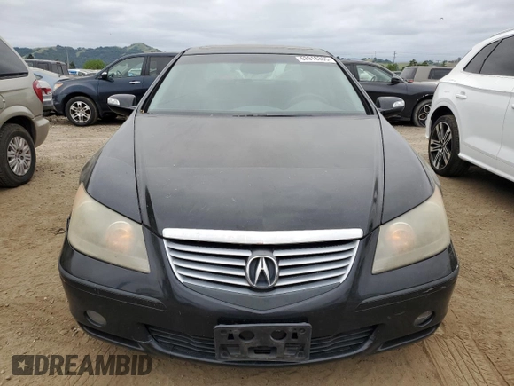2006 Acura RL z VIN JH4KB16506C011226, wystawiony jako Copart lot #53918385 z przebiegiem 200 433 mil mil oraz Szkoda całkowita • Salvage title. Historia ofert i sprzedaży dostępna na DreamBid. Obrazek 5.