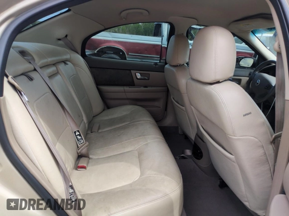 2001 Mercury Sable LS Premium with VIN 1MEHM55S51A604989, listed as a Copart auction lot 57890935 with 113,793 mi miles and Salvage title. Bid and sale history available at DreamBid. Image 10.
