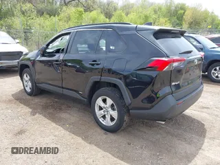 2021 Toyota RAV4 Hybrid LE with VIN 2T3L6RFV7MW011159, listed as a IAAI auction lot 42212998 with 104,626 mi miles and . Bid and sale history available at DreamBid. Image 3.