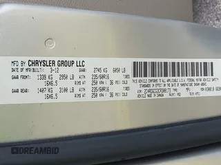 2012 Dodge Grand Caravan SXT with VIN 2C4RDGCG3CR308173, listed as a IAAI auction lot 42255879 with 96,489 mi miles and . Bid and sale history available at DreamBid. Image 9.
