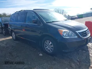 2010 Honda Odyssey EX-L with VIN 5FNRL3H76AB101807, listed as a IAAI auction lot 41221054 with 214,940 mi miles. Bid and sale history available at carsss.com. Image 1.
