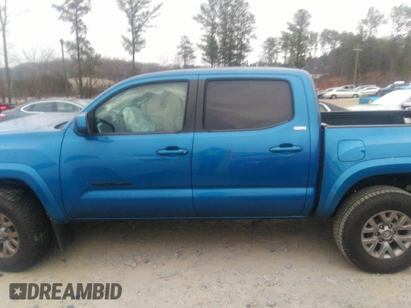 2018 Toyota Tacoma SR5 with VIN 3TMAZ5CN3JM066409, listed as a IAAI auction lot 41204775 with 75,000 mi miles and . Bid and sale history available at DreamBid. Image 14.