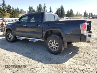 2018 Toyota Tacoma SR with VIN 3TMGZ5AN6JM163097, listed as a Copart auction lot 52633665 with 39,910 mi miles and Salvage Title. Bid and sale history available at DreamBid. Image 2.