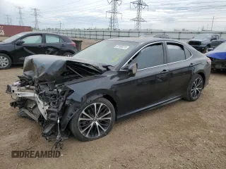 2018 Toyota Camry LE with VIN 4T1B11HKXJU590506, listed as a Copart auction lot 57498415 with Not provided miles and Salvage title. Bid and sale history available at DreamBid. Image 1.