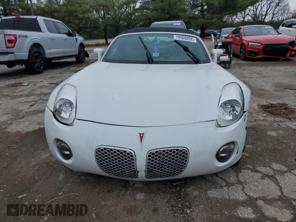 2006 Pontiac Solstice z VIN 1G2MB33B56Y106095, wystawiony jako Copart lot #79906094 z przebiegiem 54 475 mil mil oraz Szkoda całkowita • Salvage title. Historia ofert i sprzedaży dostępna na DreamBid. Obrazek 5.