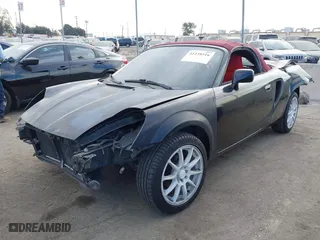 2001 Toyota MR2 Spyder with VIN JTDFR320710035330, listed as a IAAI auction lot 41238516 with 160,405 mi miles. Bid and sale history available at carsss.com. Image 2.