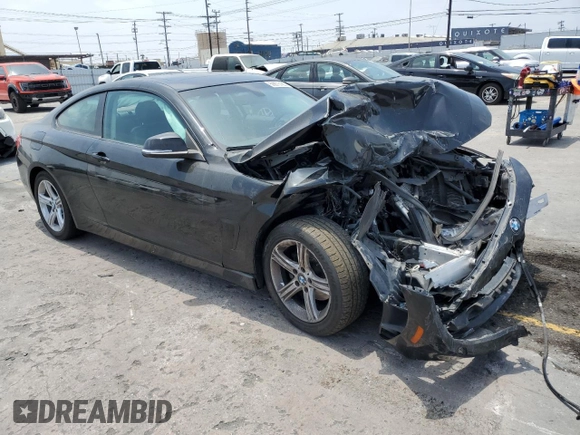 2014 BMW 4 Series 428i xDrive z VIN WBA3N9C56EF722472, wystawiony jako Copart lot #59873185 z przebiegiem 129 926 mil mil oraz Szkoda całkowita • Salvage title. Historia ofert i sprzedaży dostępna na DreamBid. Obrazek 4.