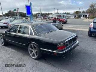 1995 Jaguar XJ with VIN SAJHX174XSC738291, listed as a Copart auction lot 87054224 with 71,076 mi miles and Clean title. Bid and sale history available at DreamBid. Image 3.