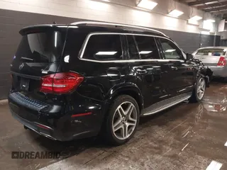 2018 Mercedes-Benz GLS 550 with VIN 4JGDF7DE1JB070994, listed as a IAAI auction lot 41676076 with 104,748 mi miles and . Bid and sale history available at DreamBid. Image 4.