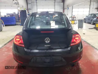 2012 Volkswagen Beetle Turbo with VIN 3VWVA7AT4CM665261, listed as a Copart auction lot 50562025 with 62,570 mi miles and Salvage Title. Bid and sale history available at DreamBid. Image 6.