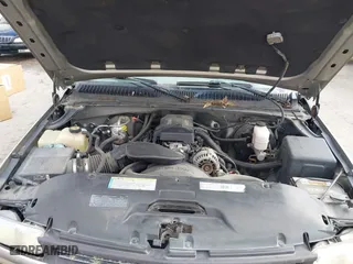 2000 Chevrolet Silverado 1500 LS with VIN 2GCEC19TXY1155977, listed as a IAAI auction lot 41158102 with 235,018 mi miles. Bid and sale history available at carsss.com. Image 10.