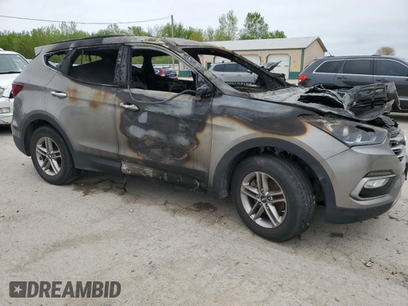 2017 Hyundai Santa Fe 2.4L z VIN 5NMZUDLB0HH042101, wystawiony jako Copart lot #55058145 z przebiegiem Nie podano mil oraz Szkoda całkowita • Salvage title. Historia ofert i sprzedaży dostępna na DreamBid. Obrazek 4.