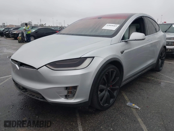 2016 Tesla Model X P90D with VIN 5YJXCBE41GF006284, listed as a IAAI auction lot 41809683 with 71,135 mi miles. Bid and sale history available at carsss.com. Image 2.