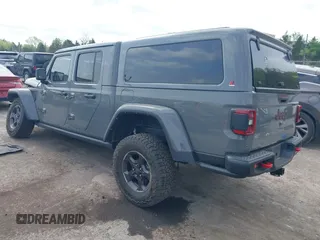2021 Jeep Gladiator Rubicon with VIN 1C6JJTBG8ML619972, listed as a IAAI auction lot 42057805 with 37,875 mi miles and . Bid and sale history available at DreamBid. Image 3.