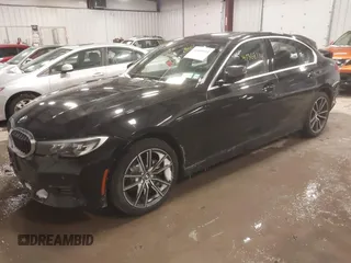 2019 BMW 3 Series 330i xDrive with VIN WBA5R7C56KAJ86102, listed as a IAAI auction lot 41368114 with 89,723 mi miles. Bid and sale history available at carsss.com. Image 2.