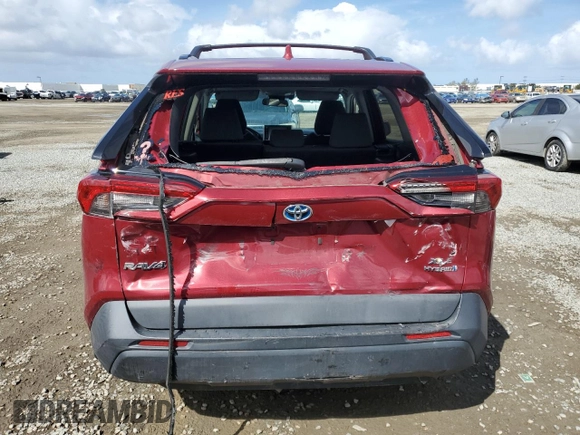 2019 Toyota RAV4 Hybrid XLE with VIN 2T3RWRFV4KW009912, listed as a Copart auction lot 51469395 with 96,489 mi miles and Salvage Title. Bid and sale history available at carsss.com. Image 6.