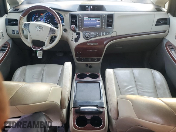 2011 Toyota Sienna XLE with VIN 5TDDK3DC1BS011963, listed as a Copart auction lot 54951565 with 196,868 mi miles and Salvage title. Bid and sale history available at DreamBid. Image 8.