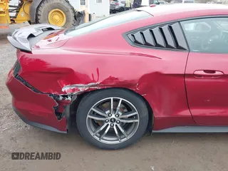 2015 Ford Mustang EcoBoost with VIN 1FA6P8TH6F5357867, listed as a IAAI auction lot 42011136 with 58,099 mi miles and . Bid and sale history available at carsss.com. Image 12.