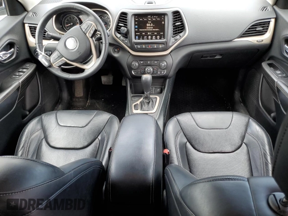 2014 Jeep Cherokee Limited with VIN 1C4PJLDS0EW148212, listed as a Copart auction lot 60464965 with 82,015 mi miles and Salvage title. Bid and sale history available at DreamBid. Image 8.