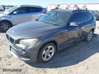 2014 BMW X1 sDrive28i with VIN WBAVM1C57EVW52502, listed as a IAAI auction lot 41702746 with 165,089 mi miles. Bid and sale history available at carsss.com. Image 17.
