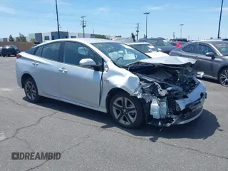 2019 Toyota Prius L Eco z VIN JTDKARFU0K3097075, wystawiony jako IAAI lot #41751482 z przebiegiem 16 558 mil mil oraz . Historia ofert i sprzedaży dostępna na DreamBid. Obrazek 1.