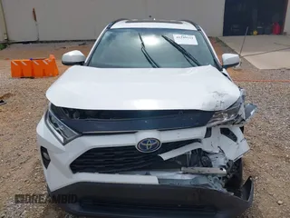 2020 Toyota RAV4 Hybrid XLE with VIN 2T3RWRFV5LW094731, listed as a IAAI auction lot 42349123 with 60,927 mi miles and . Bid and sale history available at DreamBid. Image 6.